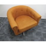 A mid- century swivel tub chair, possible Danish design, orange upholstery with buttons to the back,