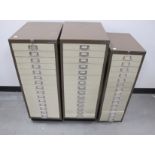Three Bisley metal office filing cabinets, all with fifteen drawers, two 35cm x 46cm x 95cm the
