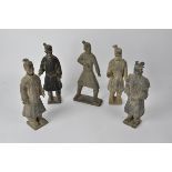 Five Chinese stoneware funerary type figures, height 38cm, several with removable heads, with