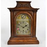 A 19th Century oak cased mantel clock, eight day movement, stamped 3303, silvered dial with Arabic