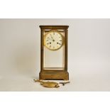 A brass four-glass mantel clock, with Roman numerals and enamel dial, height 30.5cm