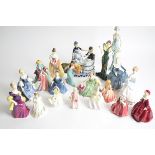 A quantity of figures from Royal Doulton, Worcester, Paragon, Coalport and other factories, to