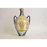 Della Robbia Pottery (Birkenhead 1894-1906), a twin handled jug with garlic head neck, with