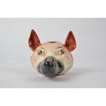 A 19th Century Staffordshire stirrup cup in the form of a fox's head, 13 cm long