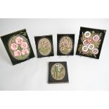 Five Swedish pottery wall plaques by Jie Gantofta, all with raised floral designs, largest 23cm x