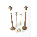 Two pairs of candlestick holders, one a graduated oak pair, height 57cm, together with three onyx