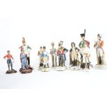 Fourteen 20th Century figures of soldiers, to include "Drummer Regiment of Artillery 1812", "