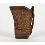 A Chinese horn libation cup with dragon to each side and key fret border, probably mid 20th