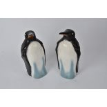 A pair of 20th century pottery penguins, height 37cm