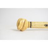 A Victorian carved ivory walking stick, taking the form of a hand grasping a coiled snake, length