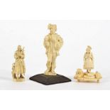 A group of European ivory and bone studies, one a goose fair figure mounted upon a wooden base,