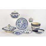 An extensive collection of blue and white British pottery, mostly in the willow pattern, some 19th