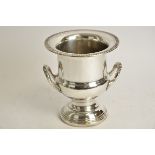 A silver plated champagne bucket, in the form of a campagna urn, height 26cm