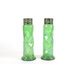 A pair of Art Nouveau green glass metal mounted glug vases, with organic motifs, height 30cm