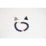 A Lapis lazuli panther bracelet, with panthers head and beads, together with two triangular lapis