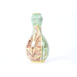 Della Robbia Pottery (Birkenhead 1894-1906), an ovoid bottle vase with alternating patterns of