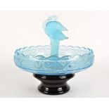 An Art Deco era blue glass centrepiece, with a flamingo figure, 29cm x 21cm, with an associated