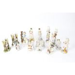 A quantity of Victorian and later fairings spill and candlestick holders, mostly Conta Boehme, to