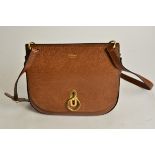 A Mulberry of England handbag, tanned leather, with turn lock, suede inside lining, a/f, 28cm x 25cm