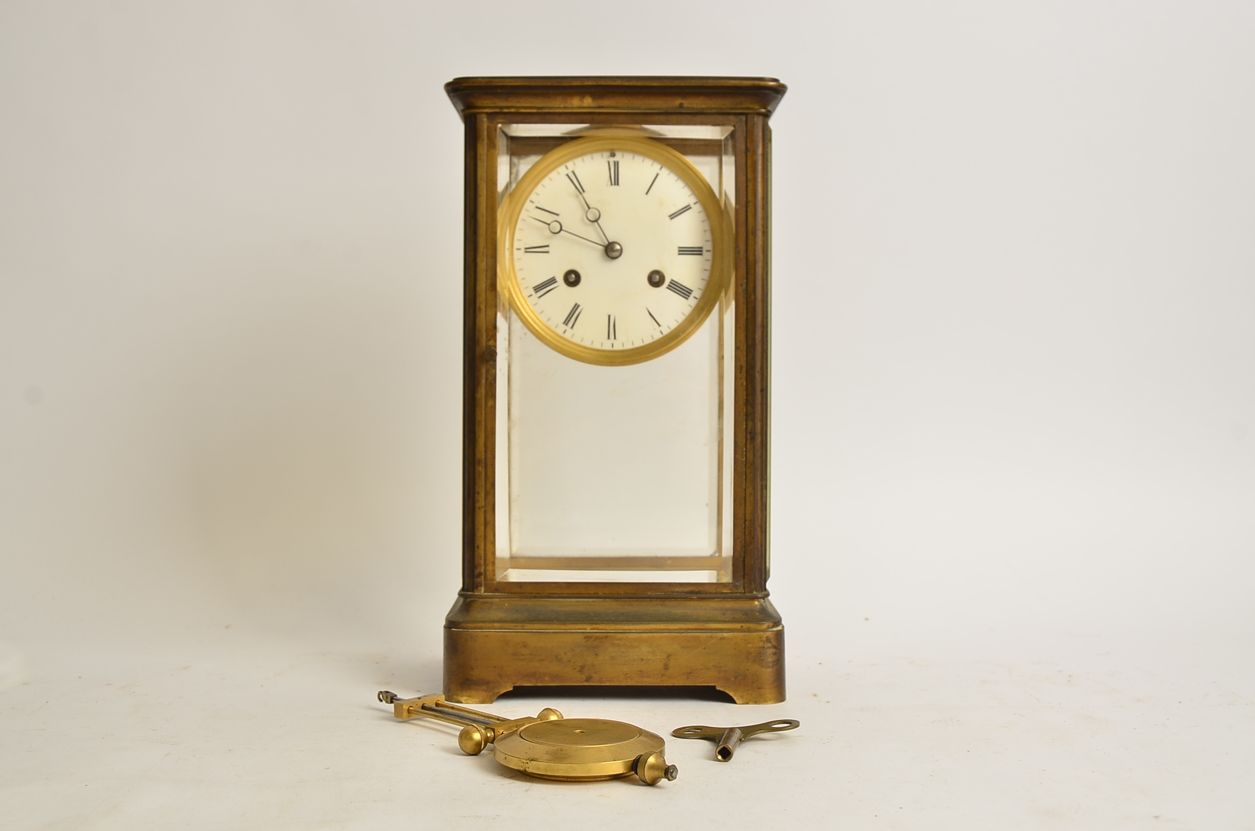 A brass four-glass mantel clock, with Roman numerals and enamel dial, height 30.5cm - Image 2 of 2