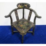 A early 20th century japanned childs corner chair, with birds and foliate decoration, seat height