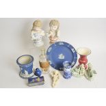 A mixed lot of British and Continental ceramics to include Wedgwood, Edwardian bisque boy and girl