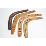 Four Aboriginal boomerangs, one being a Kookaburra, length 47.5cm