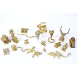A group of late 19th or early 20th Century Indian brass figures of animals, to include depictions of