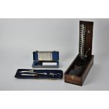 Three boxed 20th Century medical instruments, to include a otoscope, one by Short & Mason in