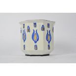 A Wardle pottery planter of octagonal form, with stylised floral decoration, in blue and yellow on a