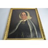 A Victorian oil on canvas of a lady in mourning, framed but unglazed, internal dimensions, 59cm x