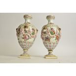 A pair of mid 19th Century Samson porcelain vases, with goats heads, swags, bows hand painted