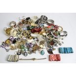 A quantity of costume jewellery, to include two coloured abalone style bangles, a cameo style ring