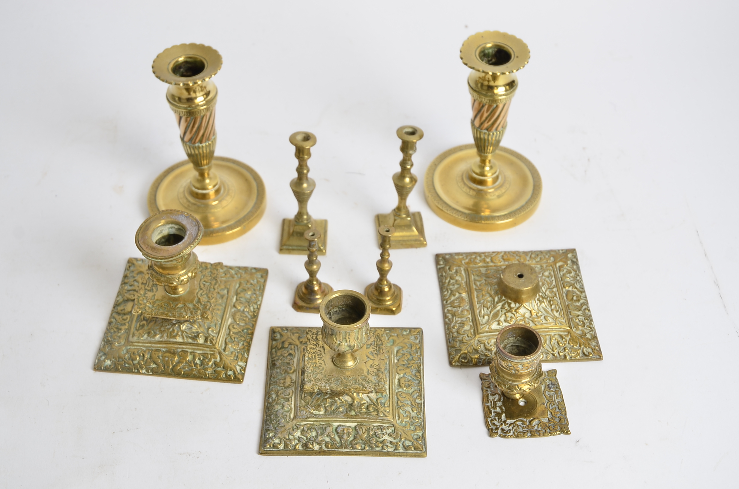 A small group of 19th Century and later candlestick holders, including two pairs, one brass and - Image 2 of 2