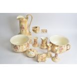 A Royal 'Crown Devon Fielding's 'Spring' pattern dressing table set, to include two chamber pots,