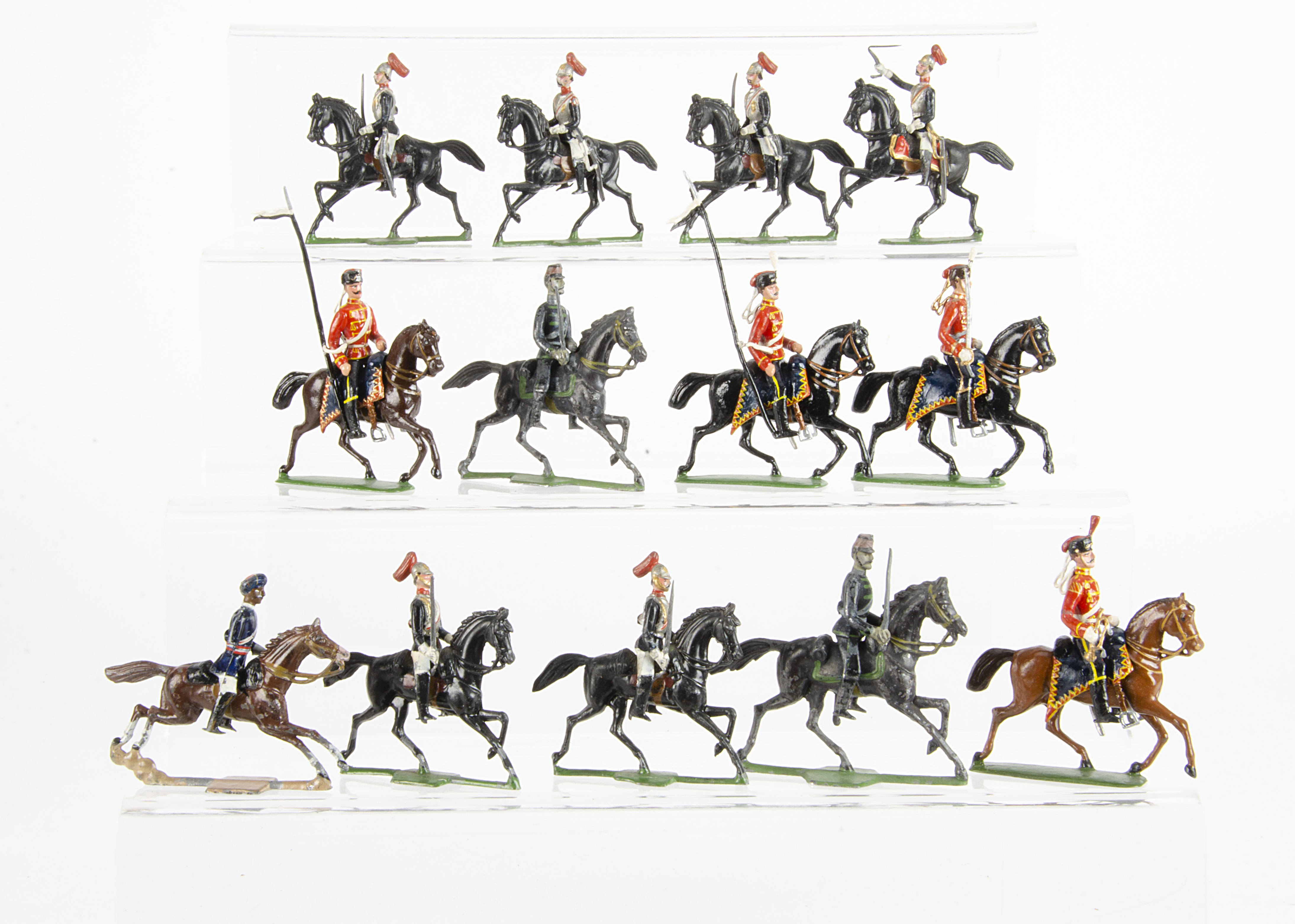 A mixture of German made mounted figures consisting of repainted 48mm scale lancers in red (4), 48mm