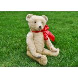 Baron Cramer a German teddy bear 1920s, with light golden mohair, clear and black glass eyes,