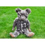 Mr T T a rare British black and grey teddy bear 1920s, possibly Teddy Toy Company with an