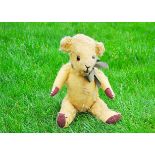 Hunny' a Hunter Toys teddy bear 1940s, with golden wool plush, orange and black glass eyes,