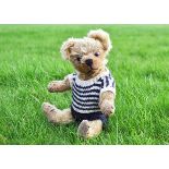 Cedric a British Terrys type teddy bear 1910 1920s with golden mohair, clear and black glass eyes
