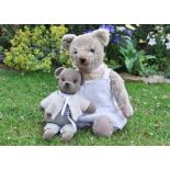 Benita and Nancy a pink mohair 1930s teddy bear, with clear and black glass eyes, pronounced muzzle,