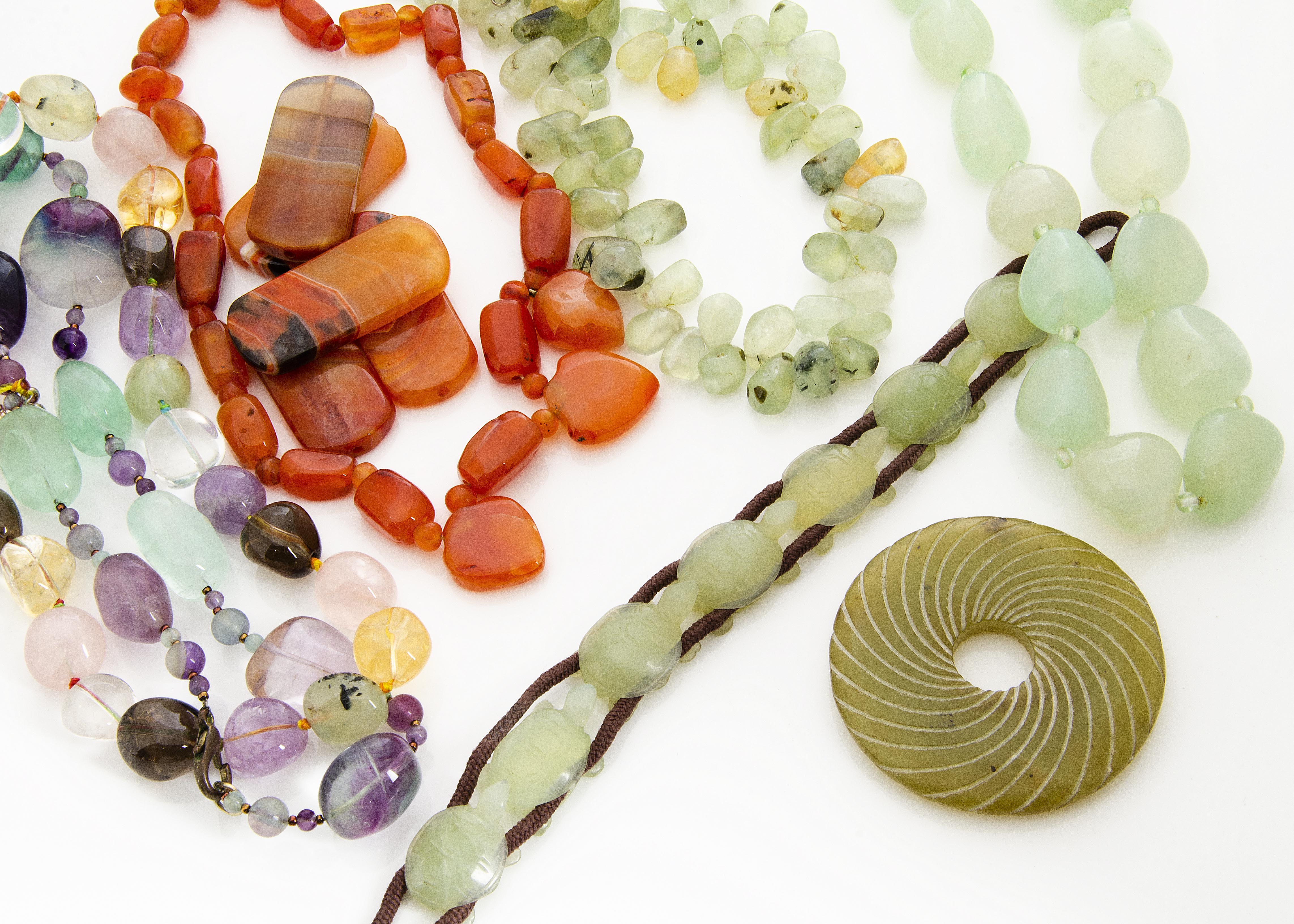A large collection of rock crystal, amethyst, citrine and hardstone necklaces, pendants and beads, - Image 2 of 2