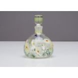 An English glass decanter and stopper, with painted summer flowers of daisies and insects