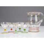 A part Art Deco lemonade and liquor set, including a shaped jug with loop strap handle, 27cm high,