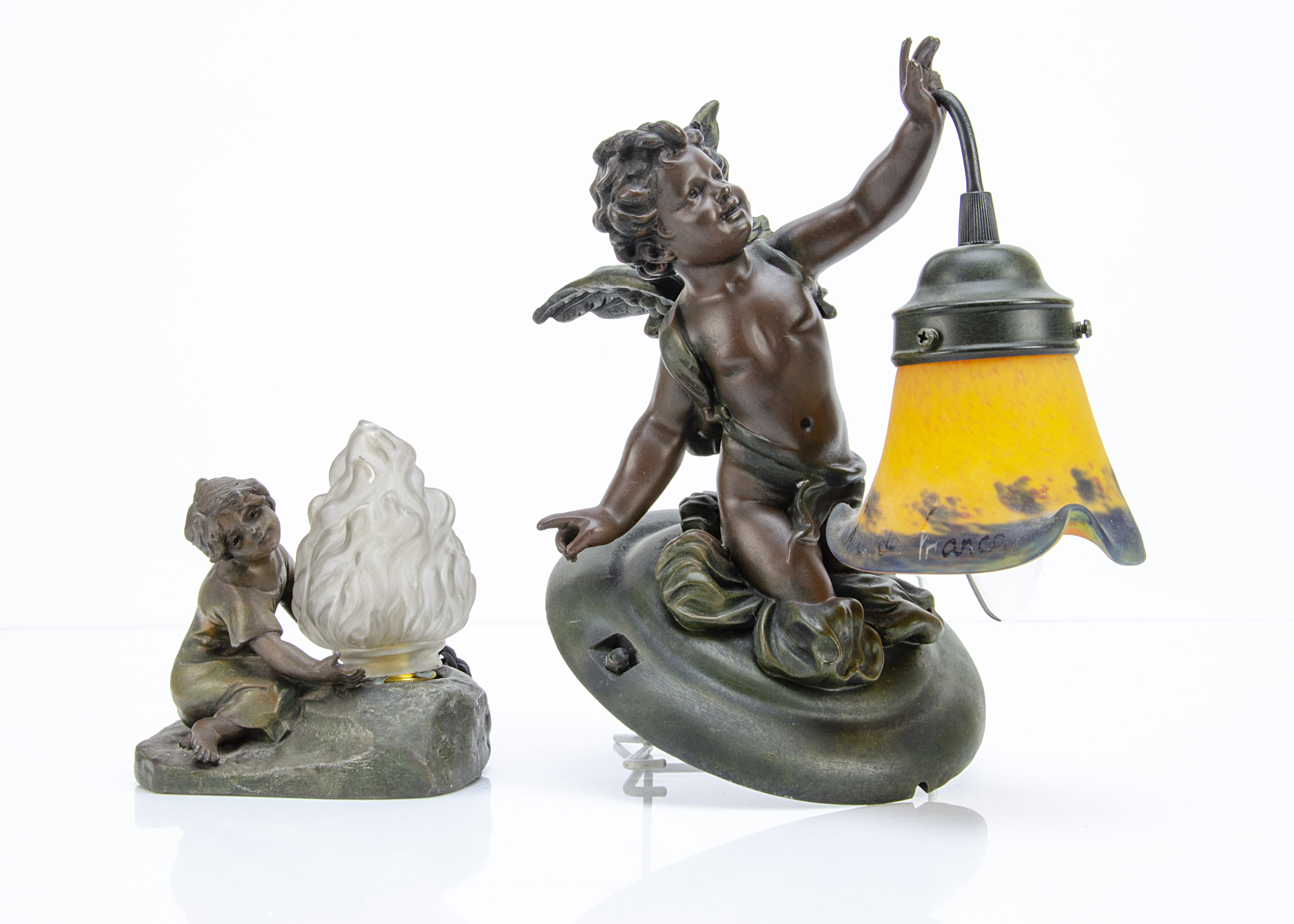 An Art Deco spelter table lamp, modelled as a young girl next to a flame, after O. Mednat, flame - Image 2 of 2