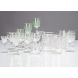 A collection of Edwardian etched glassware, including seven sherry glasses with floral design, three