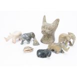 A collection of hardstone carved animals, including a carved head of a Burmese cat, soapstone