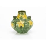 A Wileman & Co Urbato pattern Foley Chinaworks twin handled vase, with tube lined daffodil