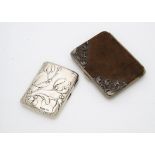 A Victorian silver cigarette case, in the Art Nouveau taste with embossed mistletoe decoration,