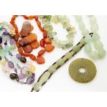 A large collection of rock crystal, amethyst, citrine and hardstone necklaces, pendants and beads,